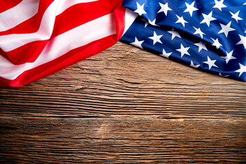 Veterans day. Honoring all who served. American flag on wooden background with copy space.