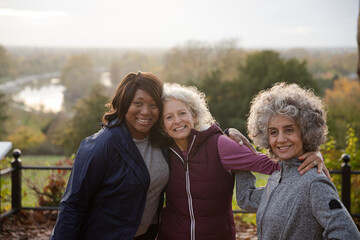 Fototapeta premium Active senior women friends in autumn park