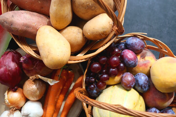 Various seasonal fruit and vegetable on dark background. Top view.