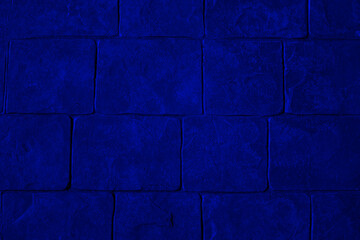 Old and damaged brick wall surface. abstract with purple cracks