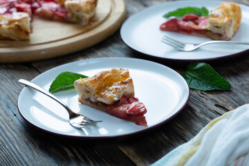 tart with strawberries on a wooden table. Copy space, top view.