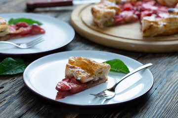 tart with strawberries on a wooden table. Copy space, top view.