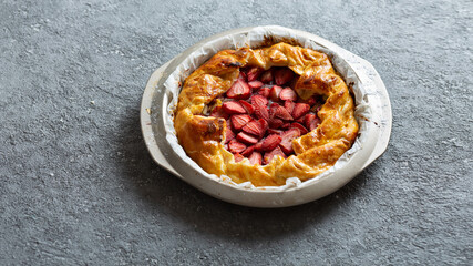 tart with strawberries. Copy space, top view.