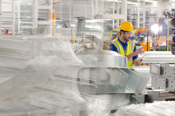 Fototapeta premium Male worker in steel factory