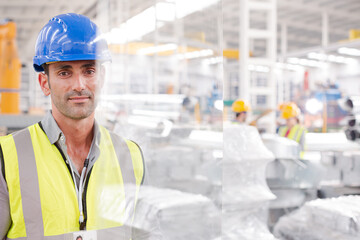 Portrait confident male worker in factory