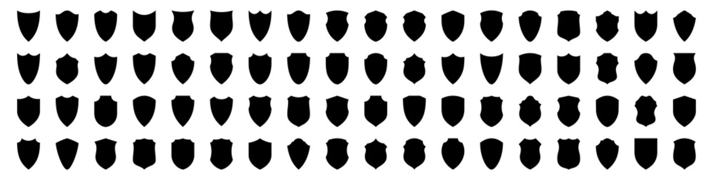 Set Of Flat Silhouette Icons Of Protective Shields. Knightly Military Shield Insignia Of Different Shapes. Vector Elements.