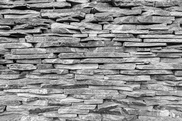 Stone paved wall as an abstract background.