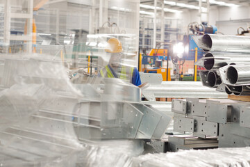 Male worker in steel factory
