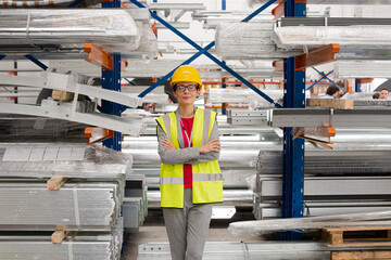 Portrait confident female supervisor in steel factory