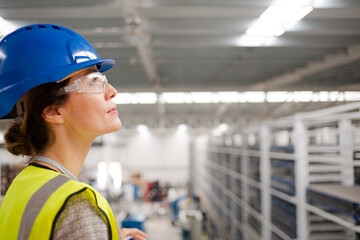 Portrait confident female supervisor in steel factory