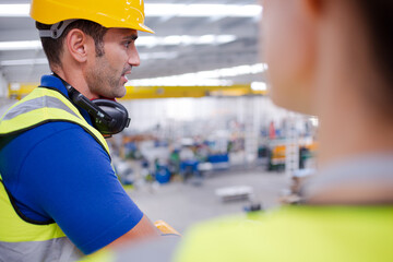 Portrait confident worker in steel factory