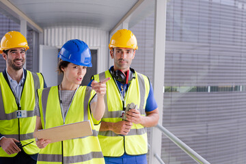 Supervisors and worker in steel factory