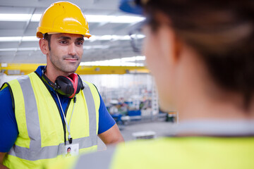 Portrait confident worker in steel factory