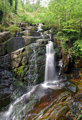 Fototapeta na wymiar Cascade de Narvau, a small waterfall in Lormes in Morvan Regional Natural Park in the region Bourgogne, France.
