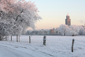 View on the city of Deventer, the Netherlands, on a cold day in winter with snow and frost