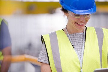 Portrait confident female worker in warehouse