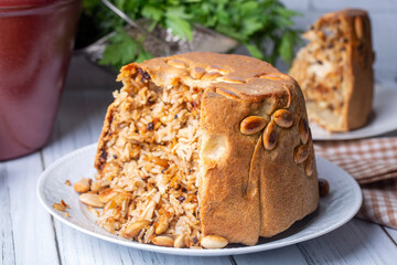 Turkish Perde Pilavi. Drape pilaf with chicken, almond and raisin. A local flavor Rice from Siirt...