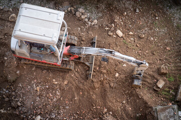 mini excavator removing earth