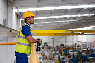 Portrait confident male worker in factory