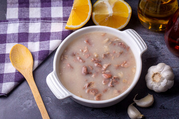 Traditional delicious Turkish food, Turkish traditional tripe soup; iskembe corbasi and offal soup, Turkish Meat Soup Kelle Paca (Turkish name; Kelle paca corbasi)