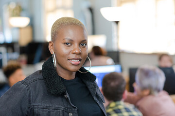 Portrait of smiling young woman in office