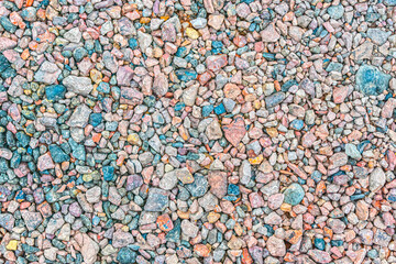 The texture of small crushed stone of different colors