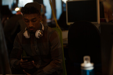 Young man working at computer in office