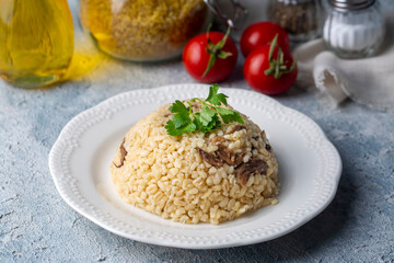 Turkish foods; Bulgur pilaf with mushrooms (Turkish name; mantarli bulgur pilavi)