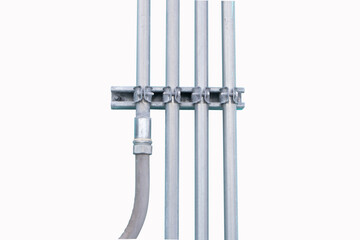 Good manage network electric cable with metal flex pipe. Isolated on white background. Installation of electrical wiring on wall. Electrical cable system installation. With screws, nuts, wall mounting