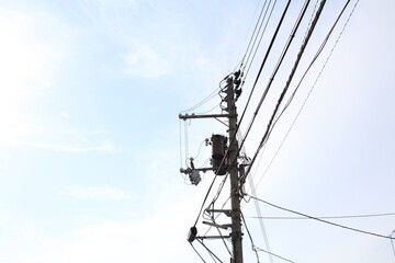 power line tower under blue sky