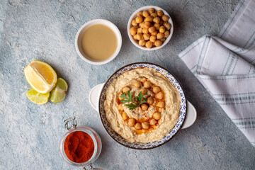 Hummus, chickpea on plate, traditional delicious Turkish food (Turkish name; Humus)