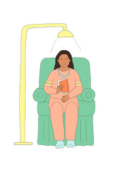 Woman sitting on chair and reading a book