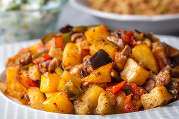 Turkish Kebab eggplant, potatoes, pepper and piece of meat. Vegetables kebab. Turkish cuisine tops view - Turkish name; Sebzeli Koz Kebab or sebze kebabi