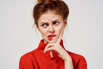 pretty woman with glasses posing light background