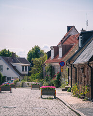 Cobblestoned street in sea village of Råå in Skåne Sweden during summer