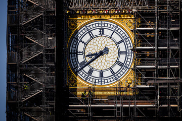 The Big Ben clock tower restored with dials and clock hands repainted Prussian blue, UK