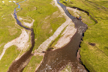 Flowing river and green grassland in Nalati grassland,Xinjiang,China.Aerial view.