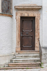 Fototapeta na wymiar Detail of an ancient wooden door in Salzkammergut, Austria, close up