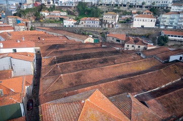 Vila Nova de Gaia, Portugal, October 31,2020. Red roofs of old wine cellars or caves where port...