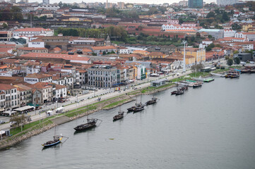 Vila Nova de Gaia, Portugal, October 31,2020. View on embankment of Douro river, old wine cellars...