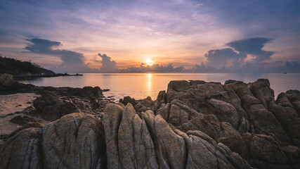Koh Samui Island, Thailand. Scenic island's dawn view at peaceful bay with sunrise's colorful...