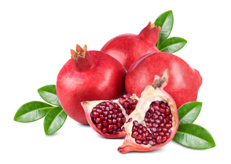 Ripe sweet fruits of pomegranate and pomegranate slices with green leaves isolated on white background.