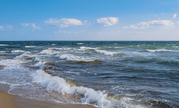 Seascape with stormy white waves rolling in on the South Cape Beach in Mashpee, Massachusetts