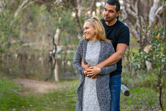 aboriginal couple in bushland setting