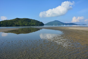 Ubatuba beach, Barra Seca, sunny day and low tide. Brazil
