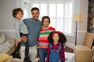 Portrait happy family in living room