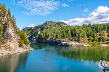 Fototapeta na wymiar The Pend Oreille River in Metaline Falls, Washington, USA, near the Canadian border at summer.