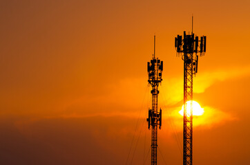 Communication tower during sunset, Silhouettes telecommunication tower on sunset background
