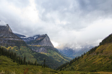 Storm clouds over mountains and valley in Glacier National Park, Montana, USA