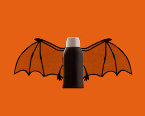 Hygiene plastic bottle mockup with black bat wings. Halloween concept with black and orange.